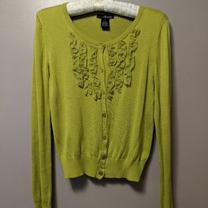 Bright green cardigan with ruffle trim